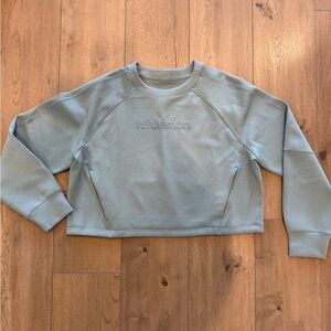 Smooth Spacer Cropped Pullover in Crater Blue. Size 10